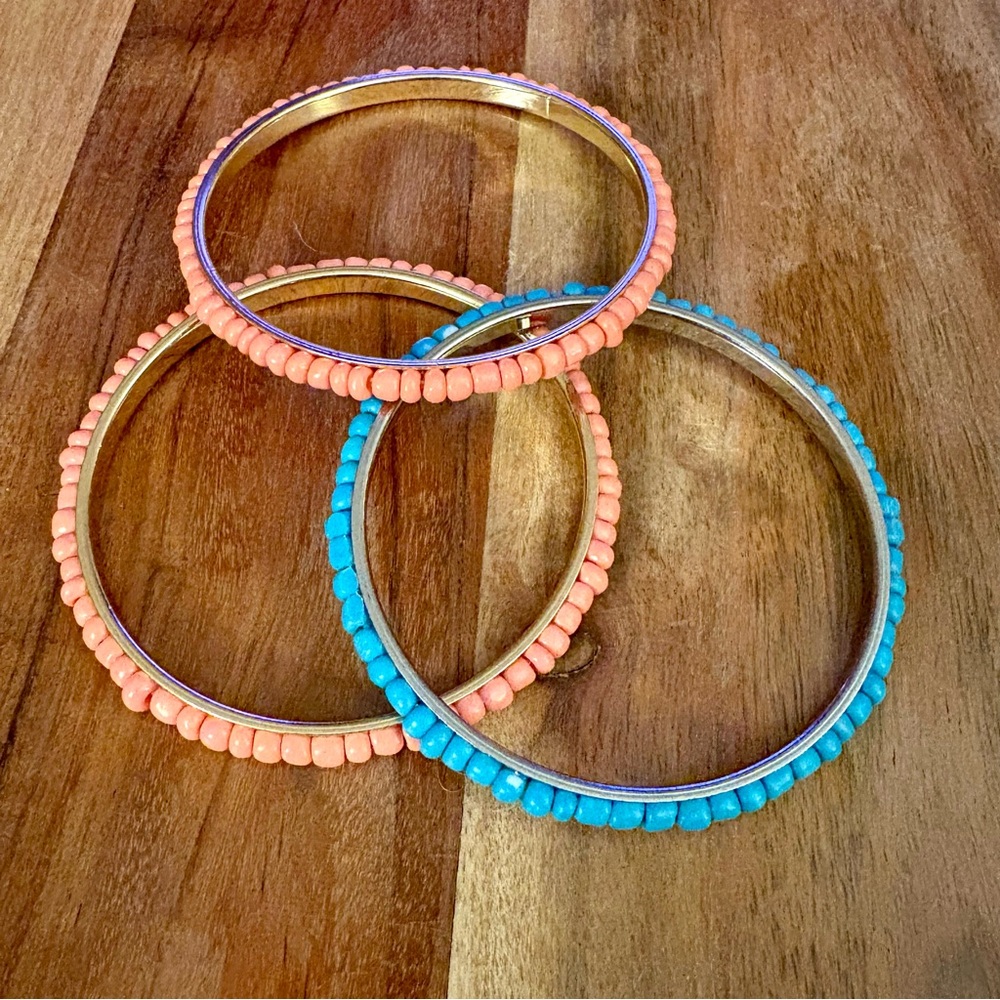Pink and blue silver tone bangle set